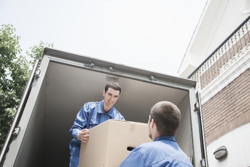 Moving boxes and furniture prepared for transport in North London