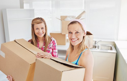 Furniture being carried safely through a Finsbury Park property