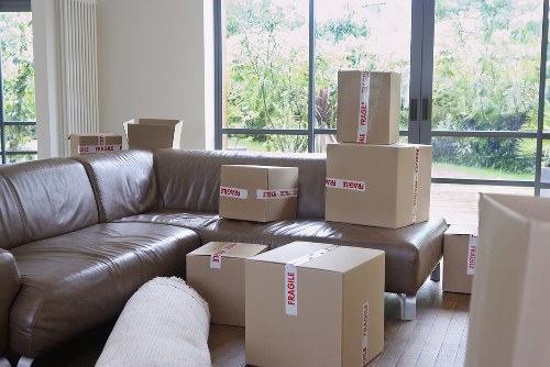 Packed boxes and furniture being prepared for a house move