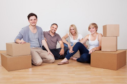 Packed office equipment and boxes prepared for local relocation